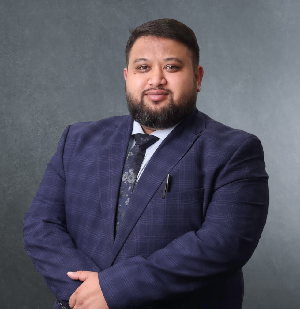 A photo of Mohammed Olly, solicitor and law firm partner at Axis Solicitors Birmingham office. Specialises in immigration cases.