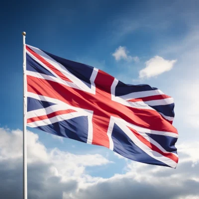 A photo of a UK flag, a familiar symbol to clients considering the UK Ancestry Visa route to UK immigration. The flag gives a positive and hopeful impression to the visitor because of the sunshine that illuminates the whole image. The visitor might feel that the future is bright when they get real legal advice and assistance for their visa application.